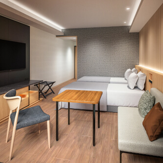 Photo: Rooms with sofa, TV and bed